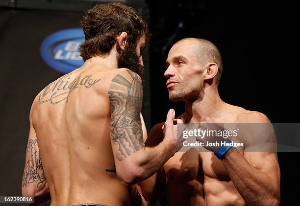 Opponents Michael Chiesa and Anton Kuivanen face off during the UFC 157 weigh-in at Honda Center on February 22, 2013 in Anaheim, California.