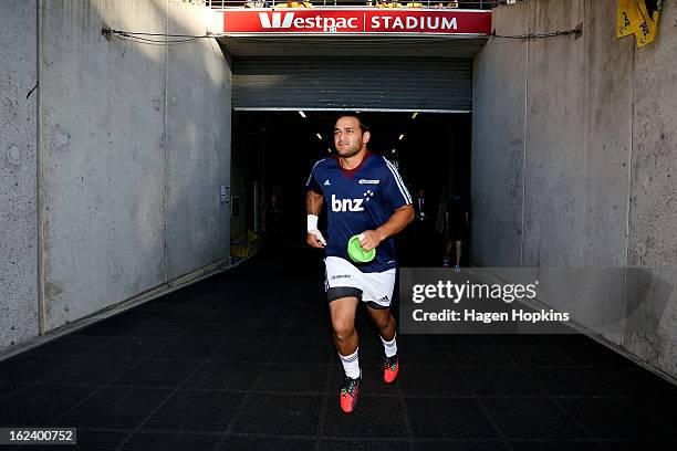 Piri Weepu of the Blues takes the field to warm up during the round two Super Rugby match between the Hurricanes and the Blues at Westpac Stadium on...