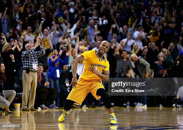 Jarrett Jack of the Golden State Warriors celebrates after he made a three-point basket in the fourth period of their game against the San Antonio...