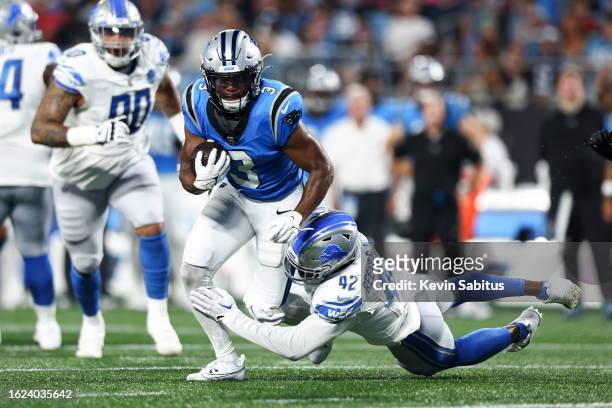 Jalen Reeves-Maybin of the Detroit Lions tackles Raheem Blackshear of the Carolina Panthers during the first quarter of an NFL preseason football...