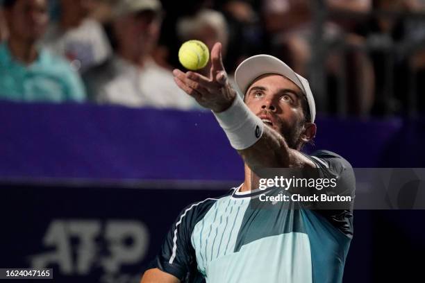 Borna Coric of Croatia prepares to serve against Sebastian Baez of Argentina during their semifinal match on day 6 of the Winston-Salem Open at Wake...