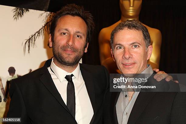 Nicolas Bulduc and producer Pierre Even of the film 'War Witch' attends the 85th annual Academy Awards Foreign Language Film Award photo-op held at...