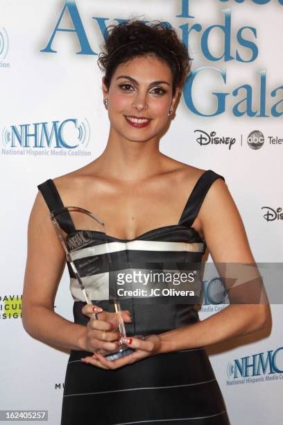 Actress Morena Baccarin poses with her Outstanding Performance in a Television Series Award during the National Hispanic Media Coalition's 16th...