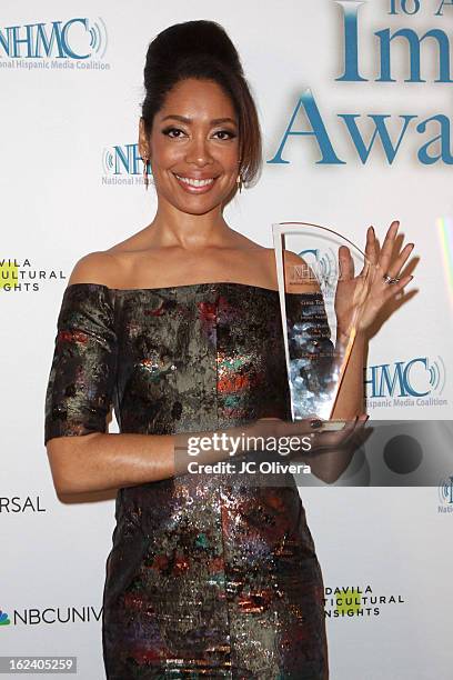 Actress Gina Torres poses with her Outstanding Performance in a Television Series Award during the National Hispanic Media Coalition's 16th Annual...