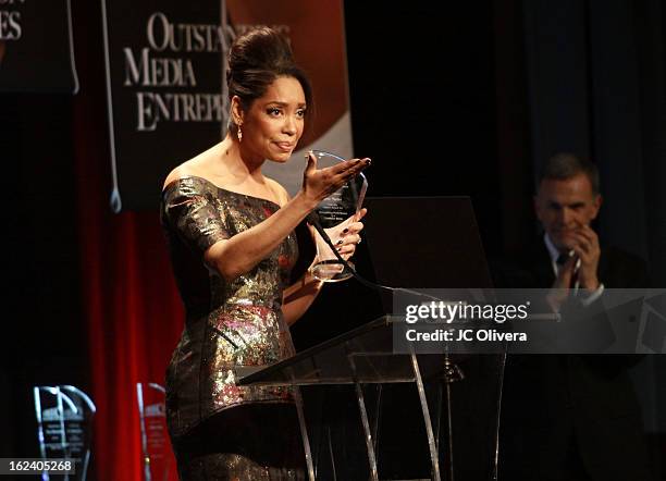 Actress Gina Torres speaks at the National Hispanic Media Coalition's 16th Annual Impact Awards Gala at the Beverly Wilshire Four Seasons Hotel on...