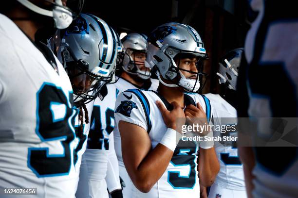 Bryce Young of the Carolina Panthers looks on in the tunnel before the first half of a preseason game against the New York Giants at MetLife Stadium...