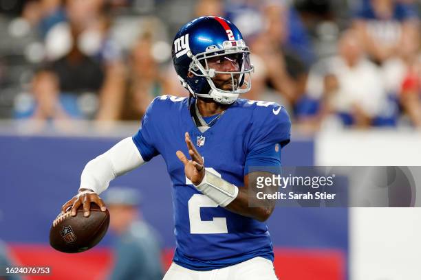 Tyrod Taylor of the New York Giants looks to pass during the first half of a preseason game against the Carolina Panthers at MetLife Stadium on...