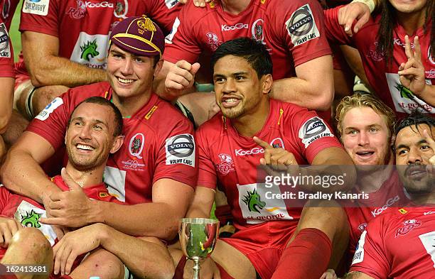 Reds players celebrate victory during the round two Super Rugby match between the Reds and the Waratahs at Suncorp Stadium on February 23, 2013 in...