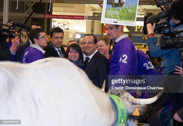 French President Francois Hollande visits the 50th International Agriculture Fair of Paris at the Porte de Versailles exhibition center on February...