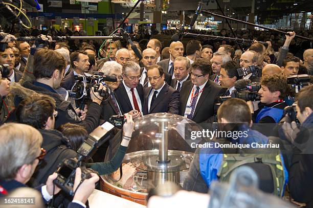 French President Francois Hollande visits the 50th International Agriculture Fair of Paris at the Porte de Versailles exhibition center on February...