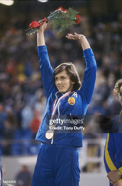 Marlies Gohr of the German Democratic Republic waving to the crowd after winning the gold medal in the 100 Metres event at the European Championships...