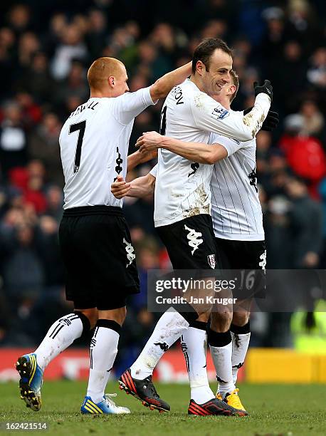 Dimitar Berbatov of Fulham celebrates his goal with team mates during the Barclays Premier League match between Fulham and Stoke City at Craven...