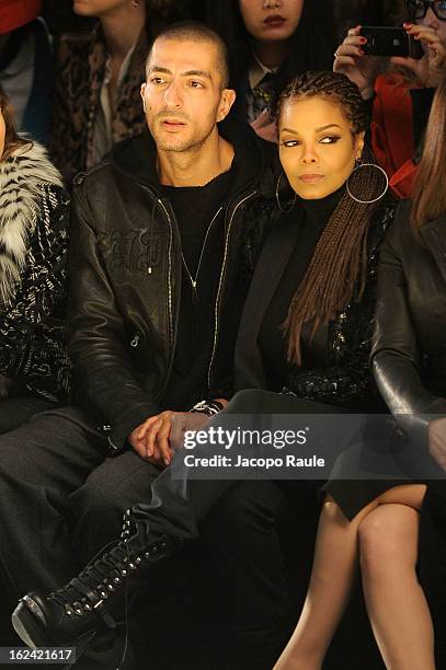 Wissam al Mana and Janet Jackson attend the Roberto Cavalli fashion show as part of Milan Fashion Week Womenswear Fall/Winter 2013/14 on February 23,...