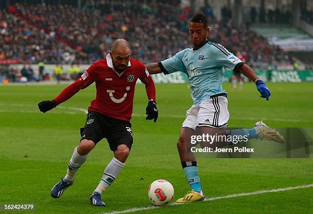 Sofian Chahed of Hannover and Dennis Aogo of Hamburg compete for the ball during the Bundesliga match between Hannover 96 and Hamburger SV at AWD...