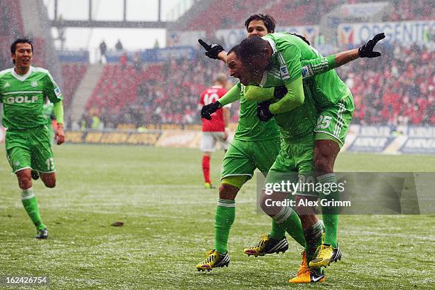 Naldo of Wolfsburg celebrates his team's first goal with team mate Jan Polak during the Bundesliga match between 1. FSV Mainz 05 and VfL Wolfsburg at...