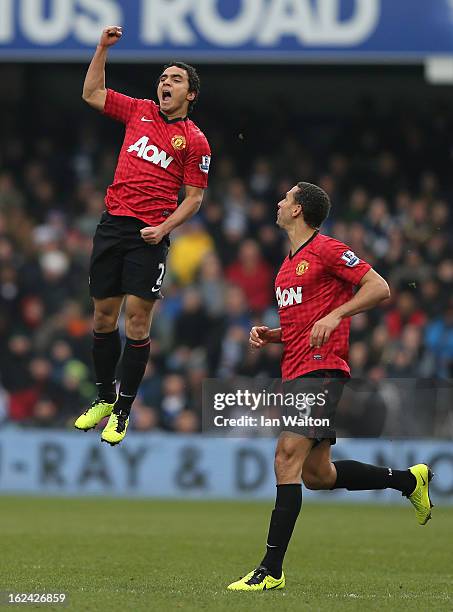Rafael of Manchester United celebrates scoring the first goal during the Barclays Premier League match between Queens Park Rangers and Manchester...
