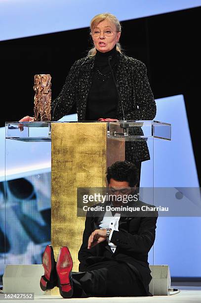 Margaret Menegoz receives the Best Film Cesar for 'Amour' on behalf of Michael Haneke next to Jamel Debbouze during the 37th Cesar Film Awards Cesar...