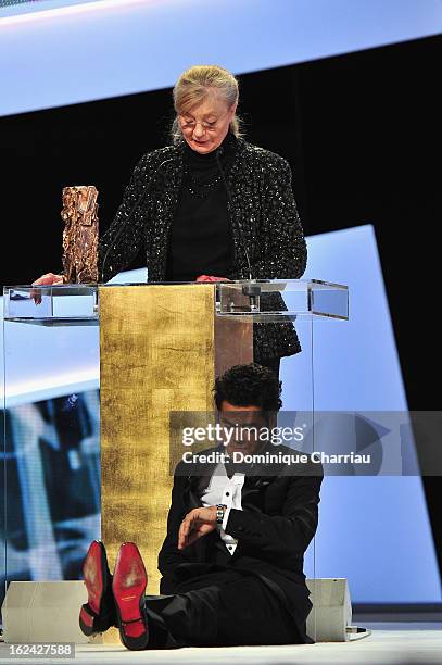 Margaret Menegoz receives the Best Film Cesar for 'Amour' on behalf of Michael Haneke next to Jamel Debbouze during the 37th Cesar Film Awards Cesar...