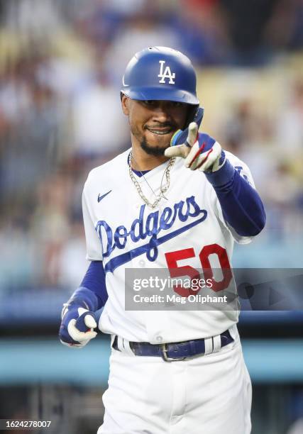 Mookie Betts of the Los Angeles Dodgers celebrates his home run in the first inning against the Miami Marlins at Dodger Stadium on August 18, 2023 in...