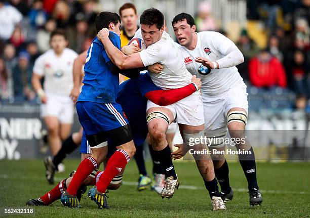 Elliot Stooke of England is tackled by Vincent Mallet of France during the U20s RBS Six Nations match between England U20 and France U20 at the...