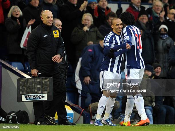 Peter Odemwingie of West Bromwich Albion replaces team-mate Romelu Lukaku during the Barclays Premier League match between West Bromwich Albion and...