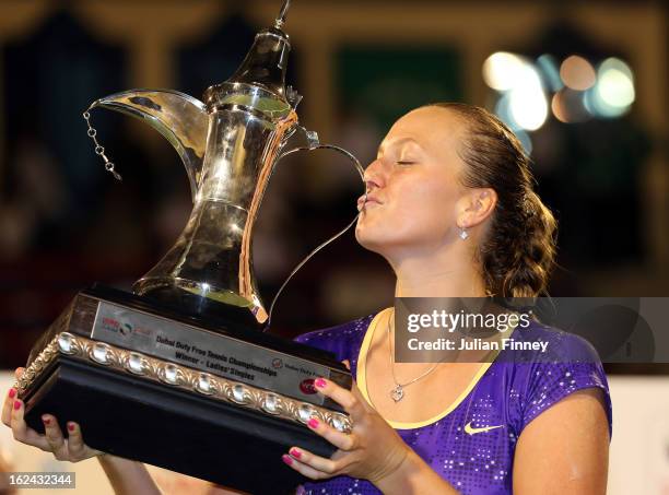 Petra Kvitova of Czech Republic kisses the trophy after defeating Sara Errani of Italy in the final during day six of the WTA Dubai Duty Free Tennis...