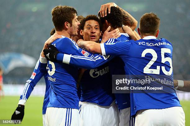 Joel Matip of Schalke celebrates the first goal with Roman Neustaedter, Jermaine Jones and Klaas-Jan Huntelaar during the Bundesliga match between FC...