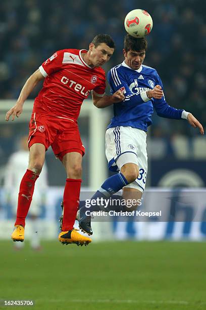 Oliver Fink of Duesseldorf and Roman Neustaedter of Schalke go up for a header during the Bundesliga match between FC Schalke 04 and Fortuna...