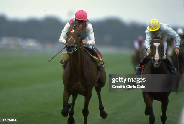 Pat Eddery of Ireland on Toulon beats Saddlers Hall to win the St. Leger at Doncaster racecourse in Doncaster, England. \ Mandatory Credit: Chris...