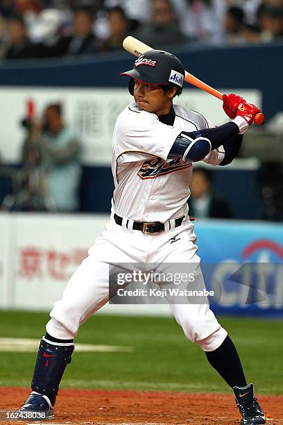 Infielder Takashi Toritani of Japan at bat during international friendly game between Japan and Australia at Kyocera Dome Osaka on February 23, 2013...