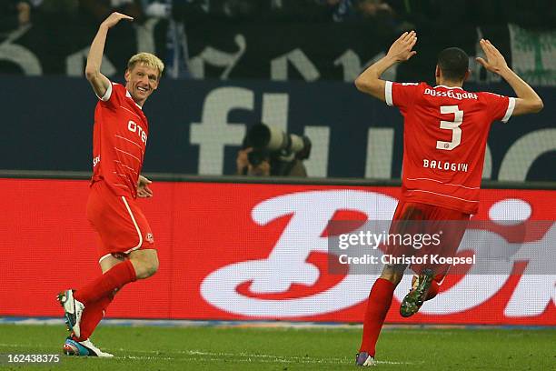 Axel Bellinghausen of Duesseldorf celebrates the first goal with Leon Balogun during the Bundesliga match between FC Schalke 04 and Fortuna...