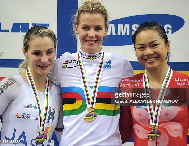 German silver medallist Kristina Vogel, British gold medallist Rebecca James and silver medallist Wai Sze Lee of Hong-Kong pose on the pudium after...