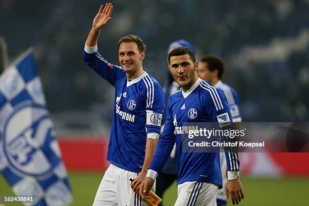 Benedikt Hoewedes and Sead Kolasinac of Schalke smile after winning 2-1 the Bundesliga match between FC Schalke 04 and Fortuna Duesseldorf at...