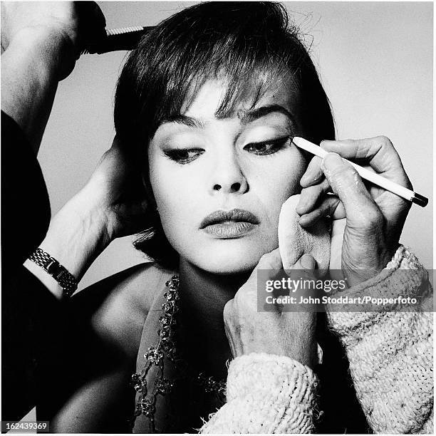 Polish-Swedish actress and model Izabella Scorupco prepares for a photoshoot, 1995. She plays Bond girl Natalya Simonova in the James Bond film...