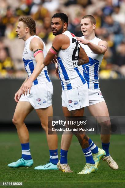 Tarryn Thomas of the Kangaroos celebrates kicking a goal during the round 23 AFL match between Richmond Tigers and North Melbourne Kangaroos at...