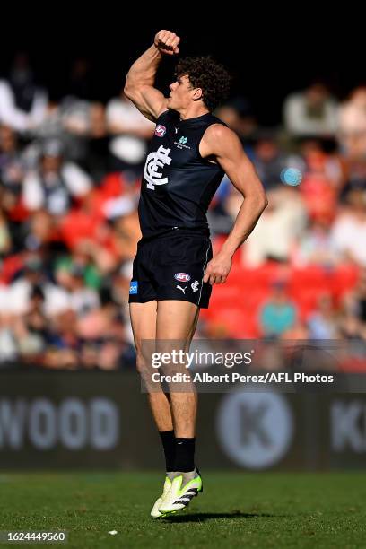 Charlie Curnow of the Blues celebrates kicking a goal during the round 23 AFL match between Gold Coast Suns and Carlton Blues at Heritage Bank...