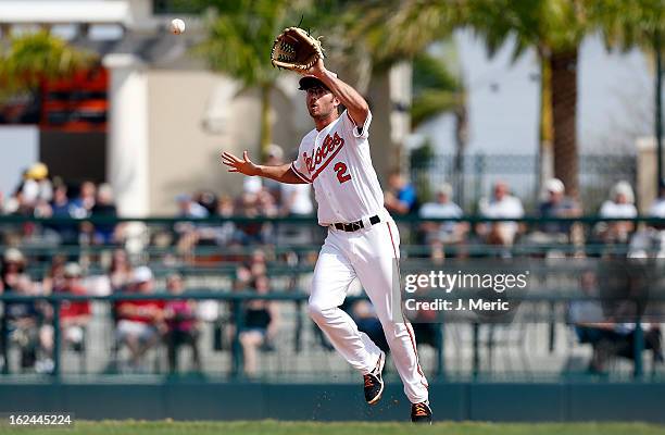 Shortstop J.J. Hardy of the Baltimore Orioles fields a ball against the Minnesota Twins during a Grapefruit League Spring Training Game at Ed Smith...