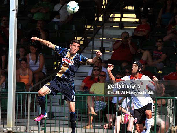 Forward Sebastien Le Toux of the Philadelphia Union jumps for a sideline ball against DC United February 23, 2013 in the final round of the Disney...