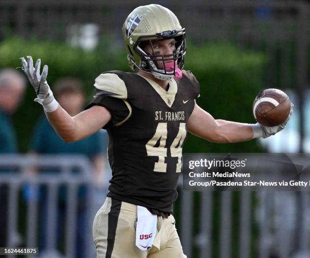 La Canada, CA Preston Jernegan of St. Francis reacts after catching a pass for a touchdown against Mira Costa in the first half of a prep football...
