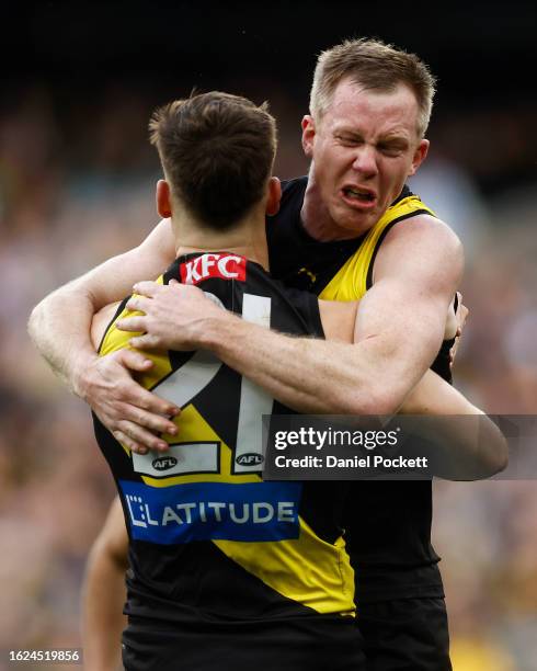 Jack Riewoldt of the Tigers celebrates a goal to Noah Balta of the Tigers during the round 23 AFL match between Richmond Tigers and North Melbourne...