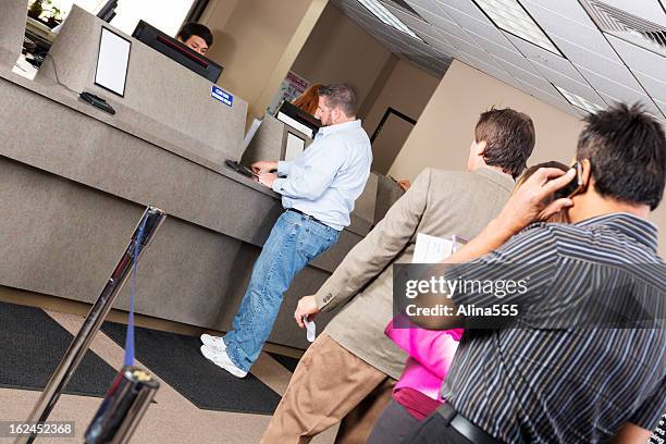 line of customers at the bank - bank teller and customer stock pictures, royalty-free photos & images