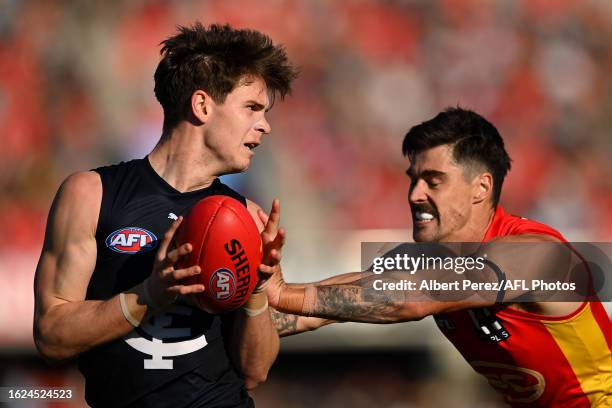 Paddy Dow of the Blues in action during the round 23 AFL match between Gold Coast Suns and Carlton Blues at Heritage Bank Stadium, on August 19 in...