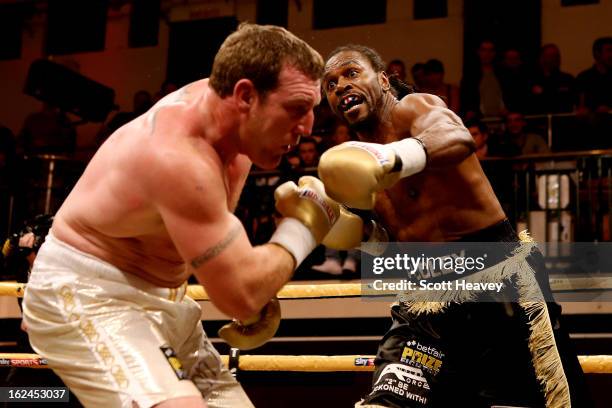 Audley Harrison in action with Martin Rogan during the International Heavywarights III betfair Prize Fighter at York Hall on February 23, 2013 in...