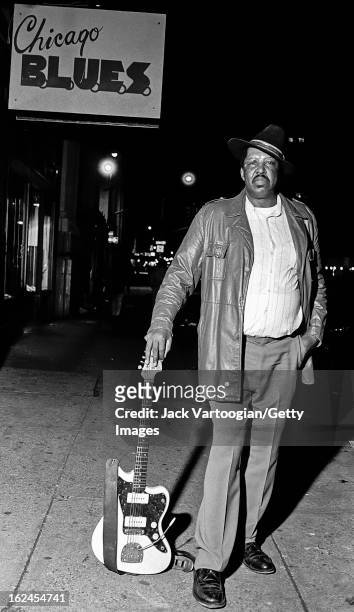 Portrait of American blues musician Magic Slim as he poses on the sidewalk outside the club, Chicago B.L.U.E.S., New York, New York, December 14,...