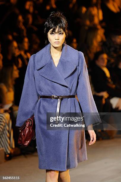 Model walks the runway at the Marc Jacobs Autumn Winter 2013 fashion show during New York Fashion Week on February 14, 2013 in New York, United...