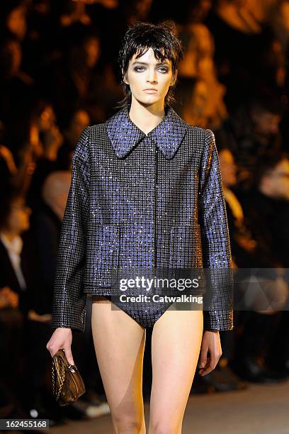 Model walks the runway at the Marc Jacobs Autumn Winter 2013 fashion show during New York Fashion Week on February 14, 2013 in New York, United...