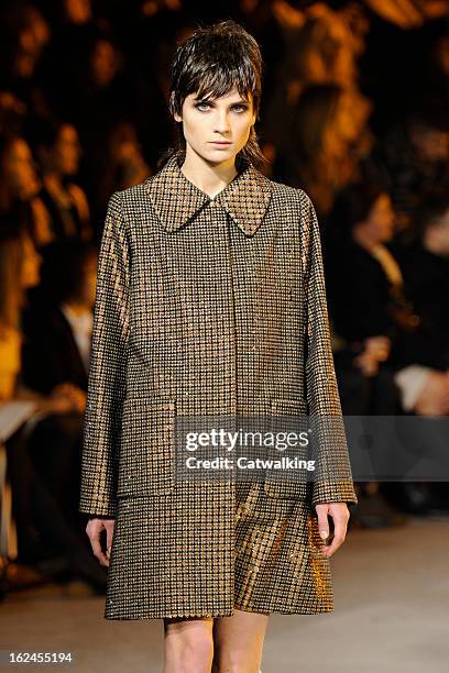 Model walks the runway at the Marc Jacobs Autumn Winter 2013 fashion show during New York Fashion Week on February 14, 2013 in New York, United...