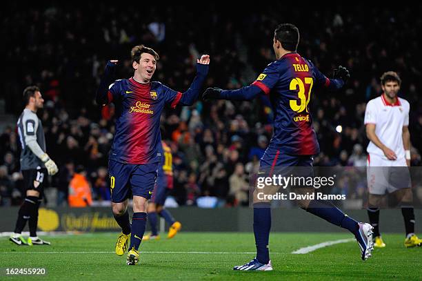 Lionel Messi of FC Barcelona celebrates with his teammate Cristian Tello after scoring his team's second goal during the La Liga match between FC...