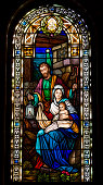 Joseph, Mary, and baby Jesus in stained glass