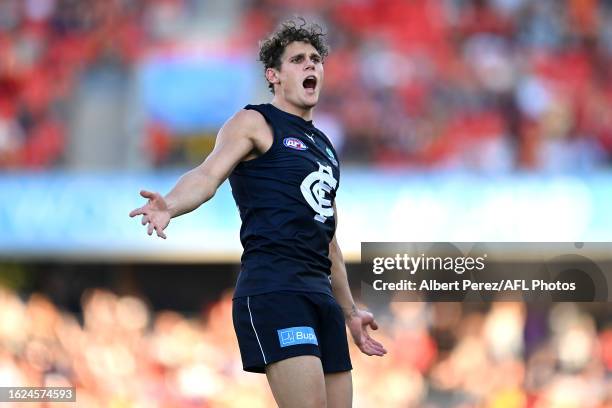 Charlie Curnow of the Blues celebrates kicking a goal during the round 23 AFL match between Gold Coast Suns and Carlton Blues at Heritage Bank...